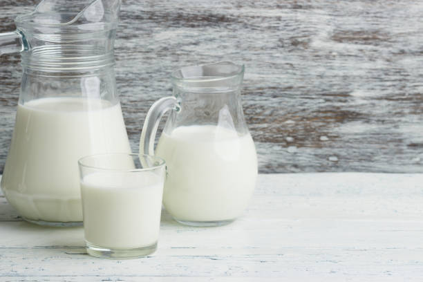 istock Different dairy products on the white wooden boards 1280571008