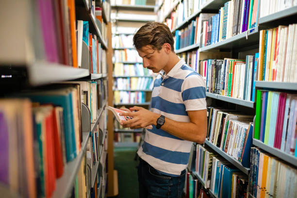 istock Books are his passion! 1280573873