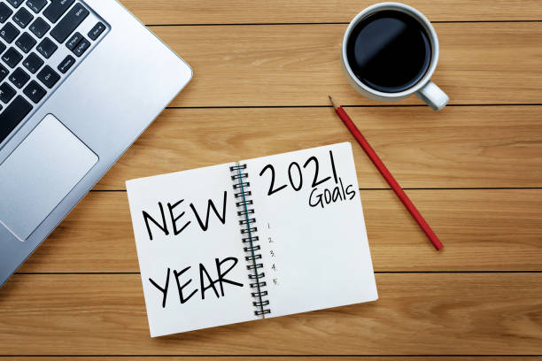 2021 happy new year resolution zielliste - determination new years eve list aspirations stock-fotos und bilder