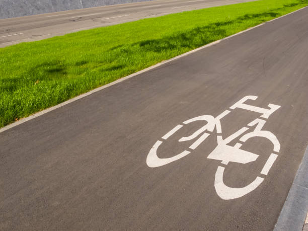 istock closeup bike path with painted bicycle sign 1280581751