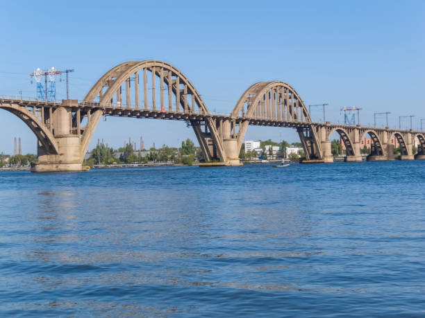 istock stony bridge over a river, urban city scene 1280582141