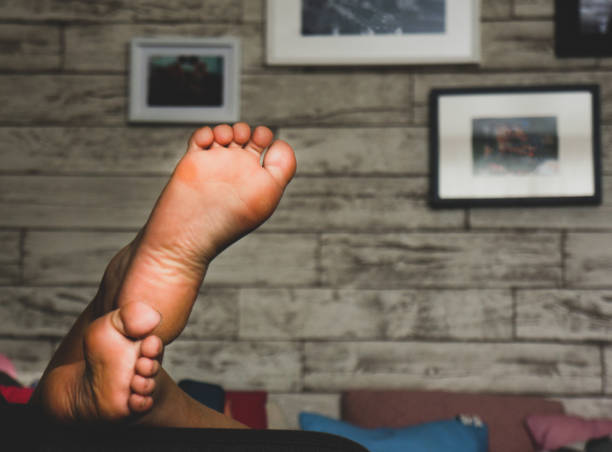 istock girl resting on the couch 1280585047