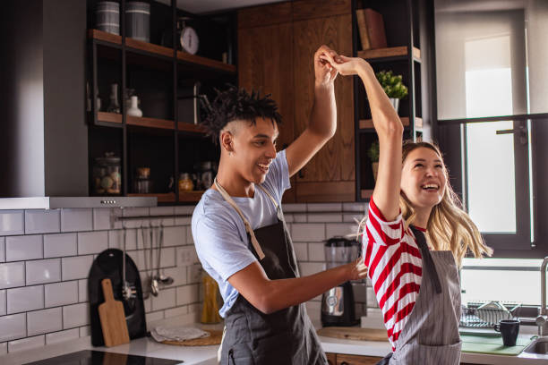 istock Young couple having fun in kitchen 1280589492
