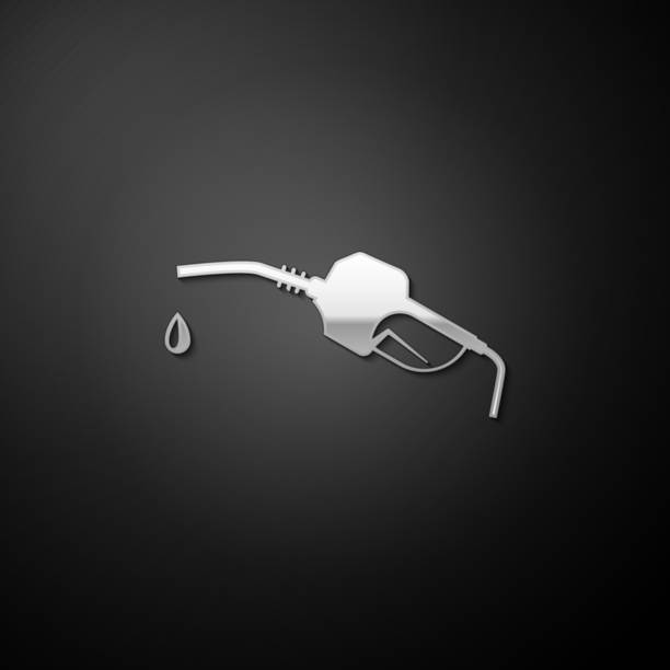 istock Silver Gasoline pump nozzle icon isolated on black background. Fuel pump petrol station. Refuel service sign. Gas station icon. Long shadow style. Vector 1280591787