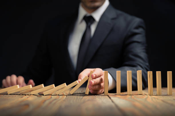 istock Protecting Assets From Domino Effect. Stop Loss Concept. 1280593432