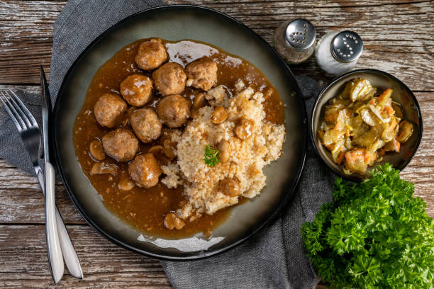 istock Minced meat balls in mushroom sauce. 1280593972