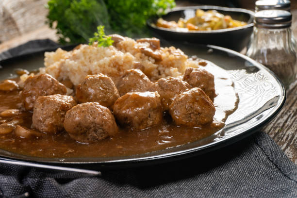 istock Minced meat balls in mushroom sauce. 1280594111