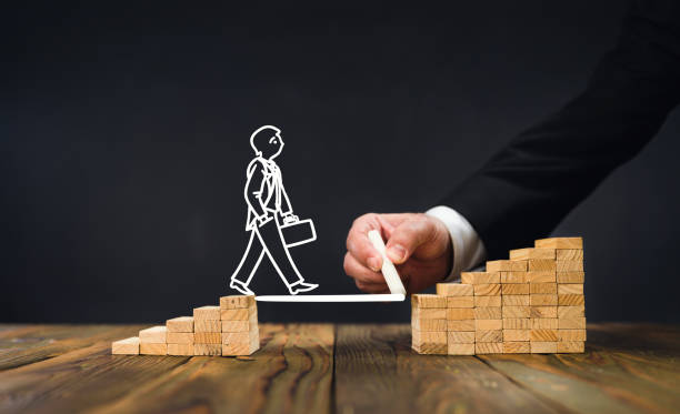 istock Career Planning Concept. Businessman Getting Help Building Bridges To Success. 1280594721
