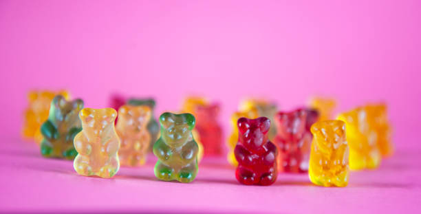 istock The jellyfish team is standing side by side on the pink background 1280606463