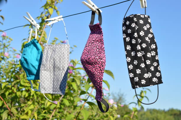 istock different self made corona cloth face masks on a line 1280613973