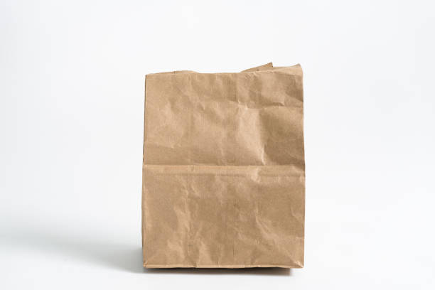 istock Paper bag isolated on white background 1280615829