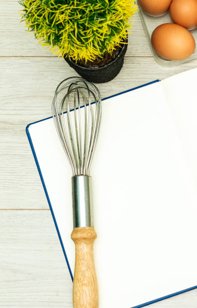 istock Open blank recipe book on wood table 1280618030