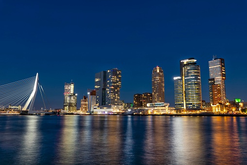 Rotterdam, Netherlands - August 7, 2020: Rotterdam nightscape near Erasmus bridge