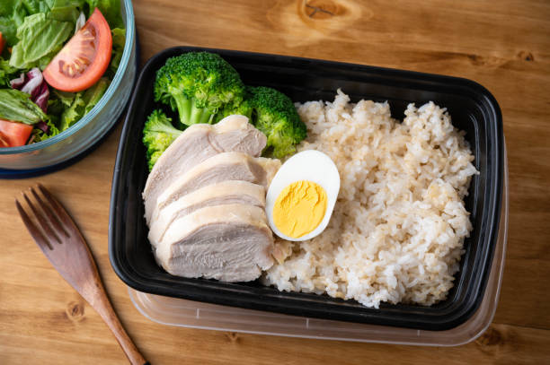 istock body building lunch box image with chicken breast and brown rice 1280622392