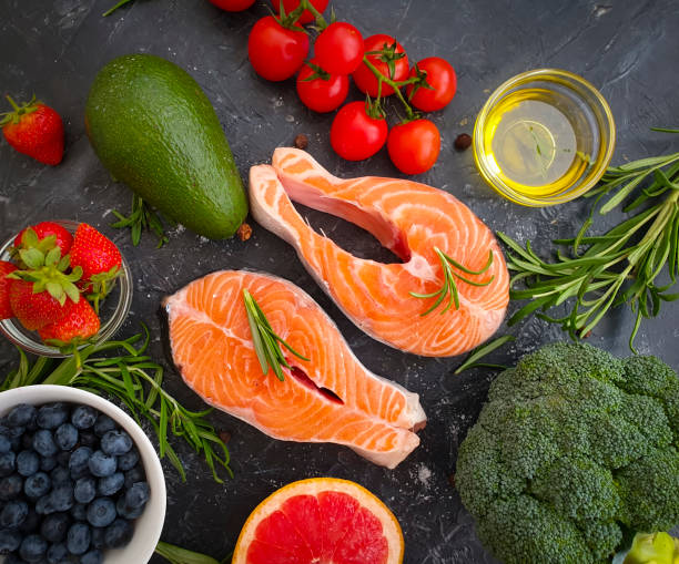 istock red fish on concrete background preparation seafood 1280628802
