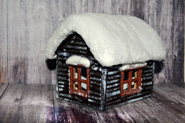istock decorative house on a wooden background 1280630084