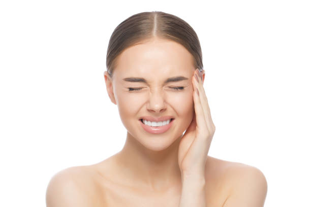 istock Young woman suffering from headache, isolated on white background 1280633262