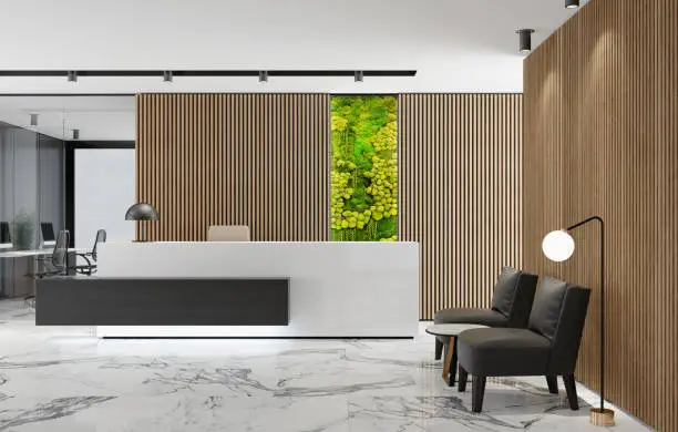 Photo of Modern Office lobby interior with long wooden planks background and reception desk with green Eco plant moss wall
