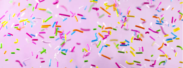 istock Abstract bright holiday background.Multicolored splashes. Decoration for confectionery, topping.Food background panorama 1280643836