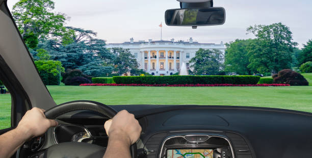 istock Driving a car towards the White House, Washington DC, USA 1280645721