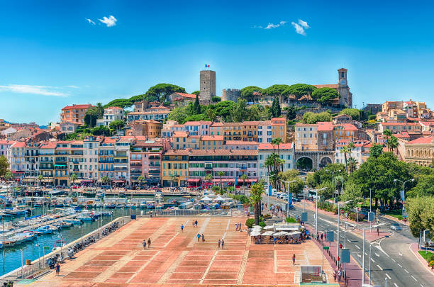 Aerial view over the Old Harbor, Cannes, Cote d'Azur, France Aerial view over the Vieux Port (Old Harbor) and Le Suquet district in Cannes, Cote d'Azur, France d'azur stock pictures, royalty-free photos & images