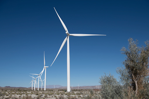 Wind mills, bright sunny day, blue skies, in the Anza Borrego desert in Ocotillo, CA, United States