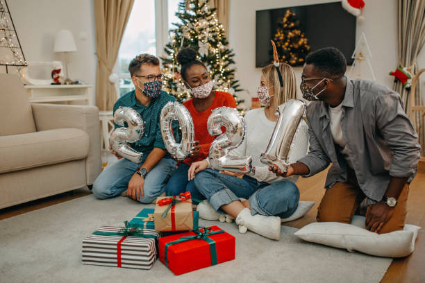 istock Young millenials celebrate New Year under COVID 1280656766