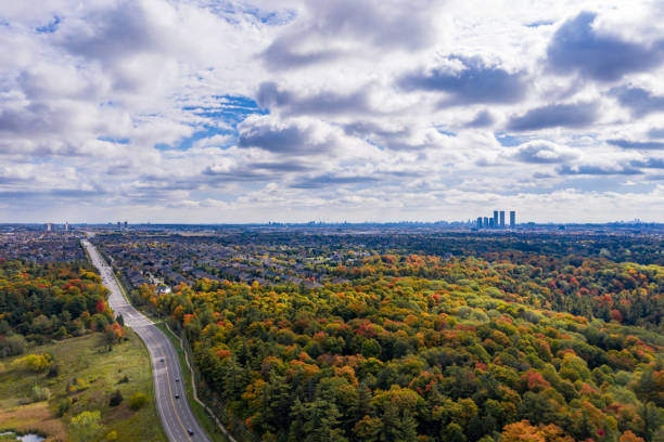 istock Rutherford Road and Boyd Conservation Park in fall, Woodbridge, Vaughan, Canada 1280659011