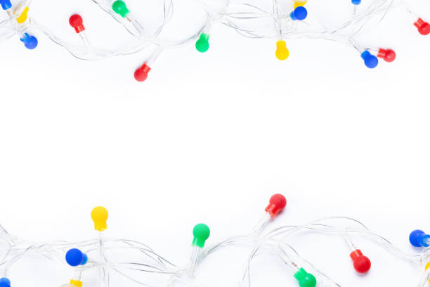 istock christmas light decoration frame border over white background. festive layout 1280659525
