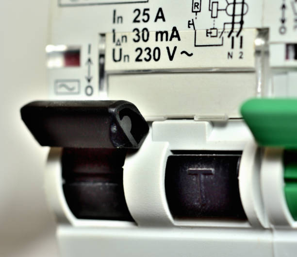 istock Detail of switches of modern circuit breakers - residual current device and differential switch with test buttons. 1280659794