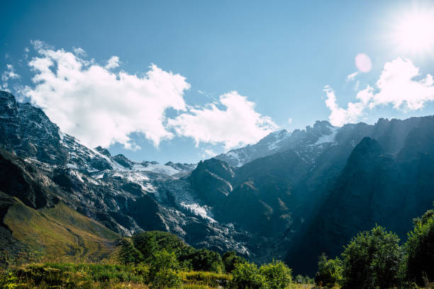 istock Picturesque scenery. Mountain against cloudy sky. Clouds floating on blue sky over mountain ridge 1280662515