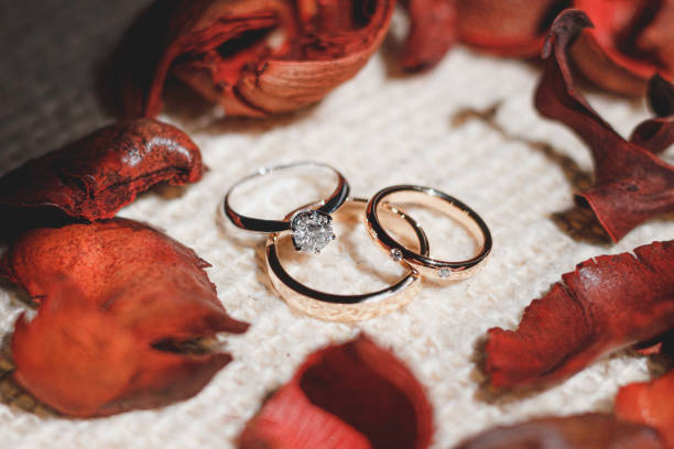 istock Diamond engagement ring and wedding rings 1280665961