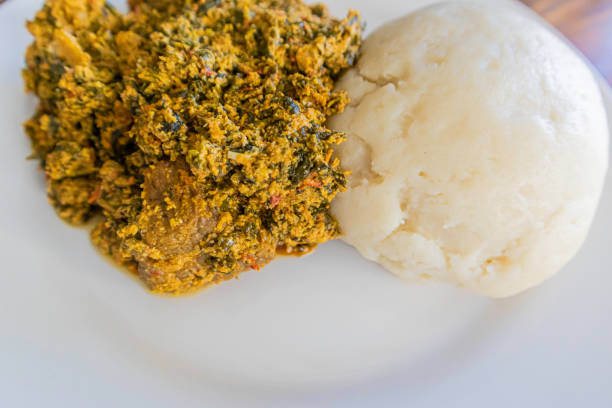 istock Nigerian Egusi Soup served with Pounded yam 1280669357