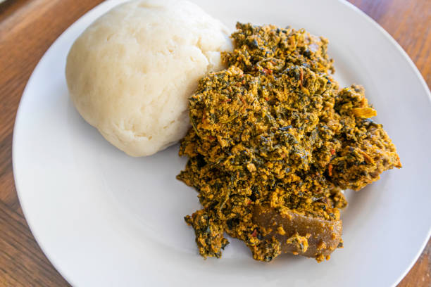 istock Nigerian Egusi Soup served with Pounded yam 1280669366