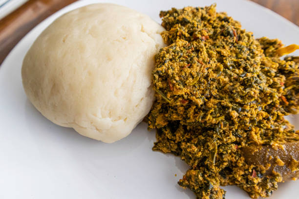 istock Nigerian Egusi Soup served with Pounded yam 1280669372