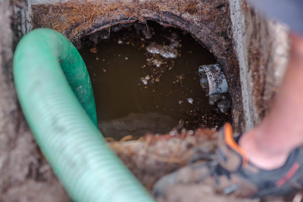 istock intervention to clean and empty a septic tank 1280678060