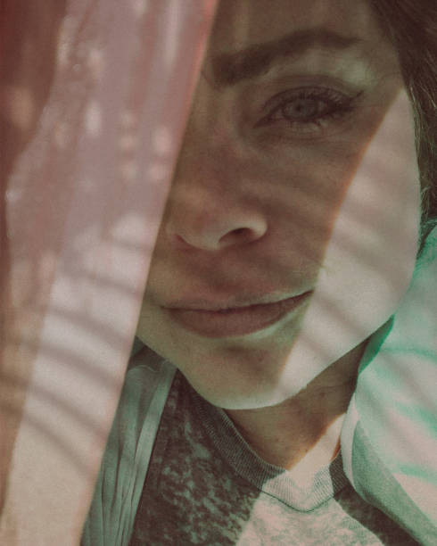 istock Beautiful mature woman’s face, peeking out from her hammock. 1280678824