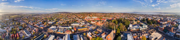 D Bath city wide mt pan fog Wide aerial panorama over Bathurst regional council and city with Mt Panorama and fog in Macquarie river valley. st george street stock pictures, royalty-free photos & images