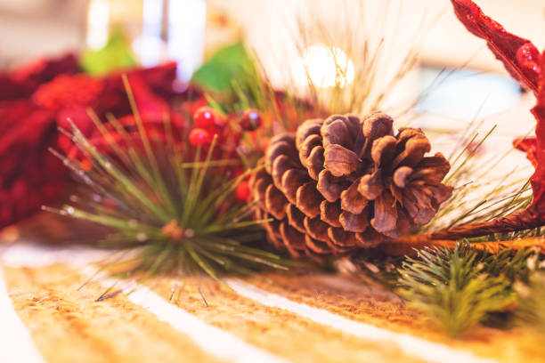 christmas decoration on the dining table - poinsettia christmas candle table imagens e fotografias de stock