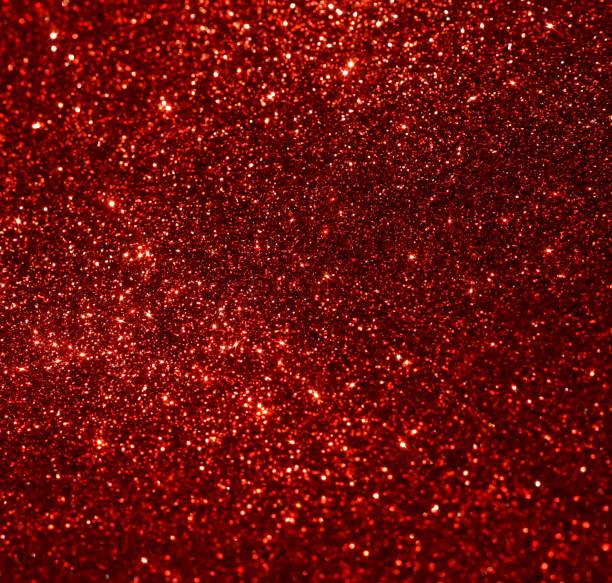 istock Sparkle glitter background red color. Xmas, festive abstract backdrop with copy space. 1280688545