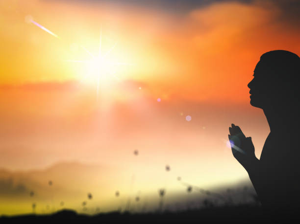 istock Woman praying to God concept 1280695209