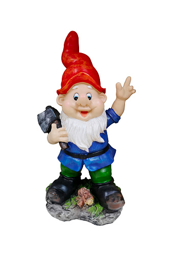 A Garden Gnome. Garden dwarf on white isolated background. Garden gnome statue isolated on white background.