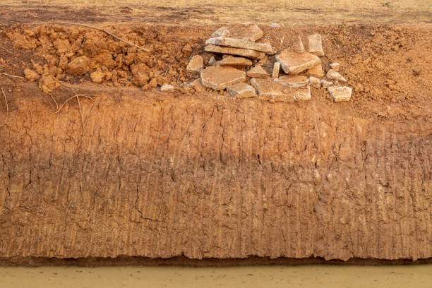 istock Concrete debris with soil, coastal canal. 1280699497