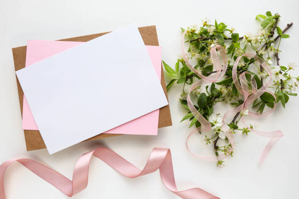 istock blossoming cherry branch and envelope. place for text. 1280699629