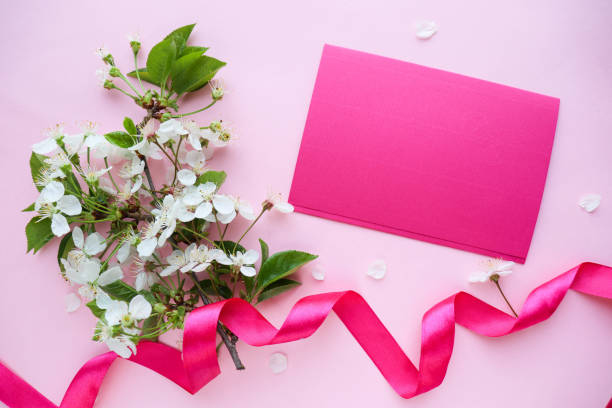 istock blossoming cherry branch and envelope. place for text. 1280699654