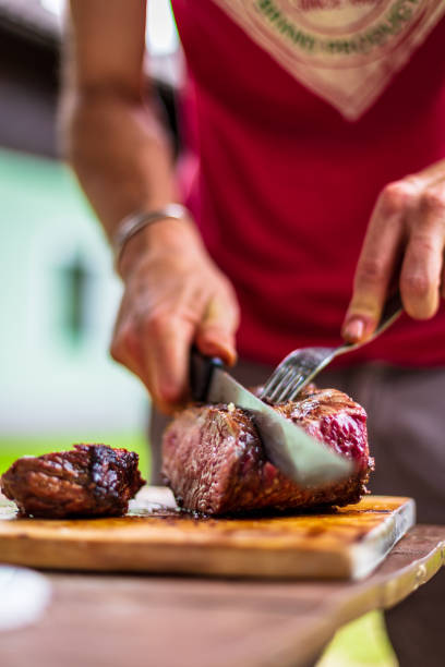 istock barbeque meat preparation in a summer day 1280701489