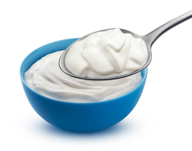 istock Fresh sour cream in blue bowl with spoon 1280703496