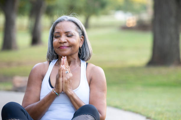 istock Beautiful senior woman doing yoga 1280704913
