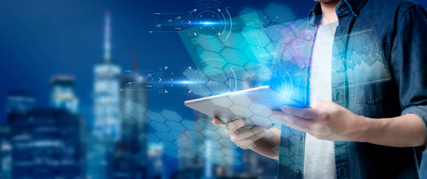 smart Asian business man using mobile tablet with financial investment digital technology, futuristic artificial intelligence tech and finance graph symbol effect, city background.