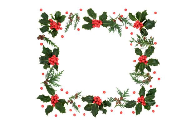 istock Winter Holly Berry and Cedar Wreath 1280707369